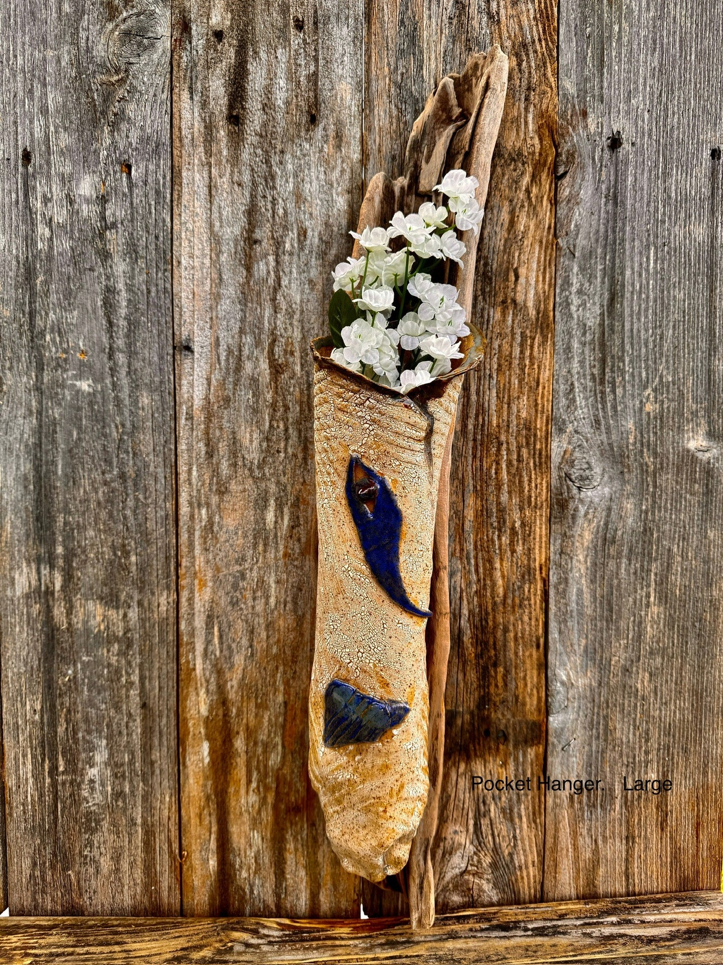 Hanging Pocket Garden with spatters of deep purple